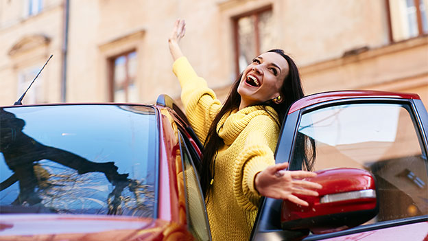 Off-road SUV driving through scenic European terrain, symbolizing freedom of travel with TÜV-compliant vehicles.