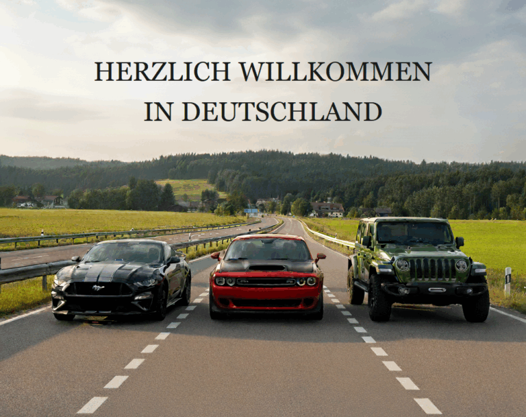 Ford Mustang, Dodge Challenger, and Jeep Wrangler parked together in the German countryside with “Welcome to Germany” sign above.